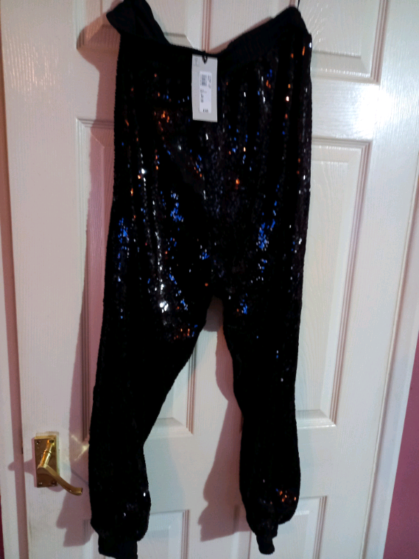 Brand new black sequin trousers from 